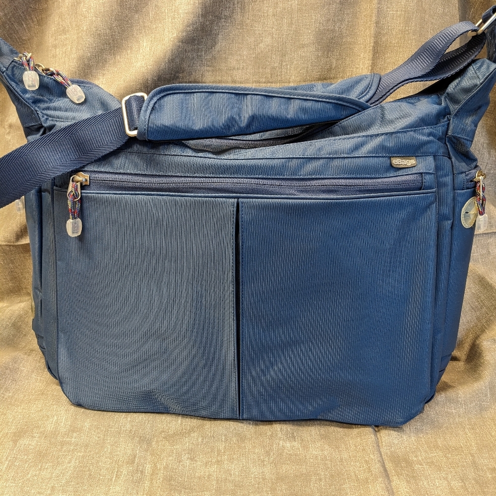 Ebags Cadet Blue travel bag w/gray interior. Five large zippered compartments.